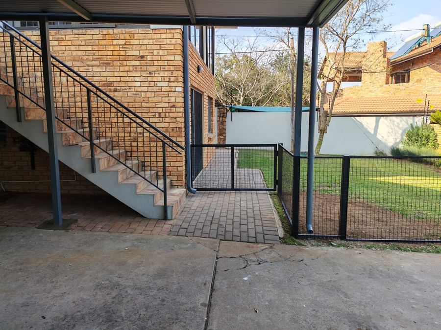 Black steel balustrade and fencing installed alongside a staircase in Rietfontein, Pretoria